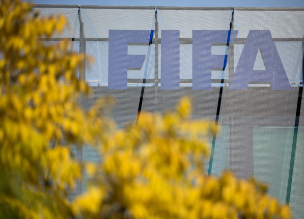ZURICH, SWITZERLAND - SEPTEMBER 25: A FIFA logo sits on the rooftop at the FIFA headquarters on September 25, 2015 in Zurich, Switzerland. (Photo by Philipp Schmidli/Getty Images)