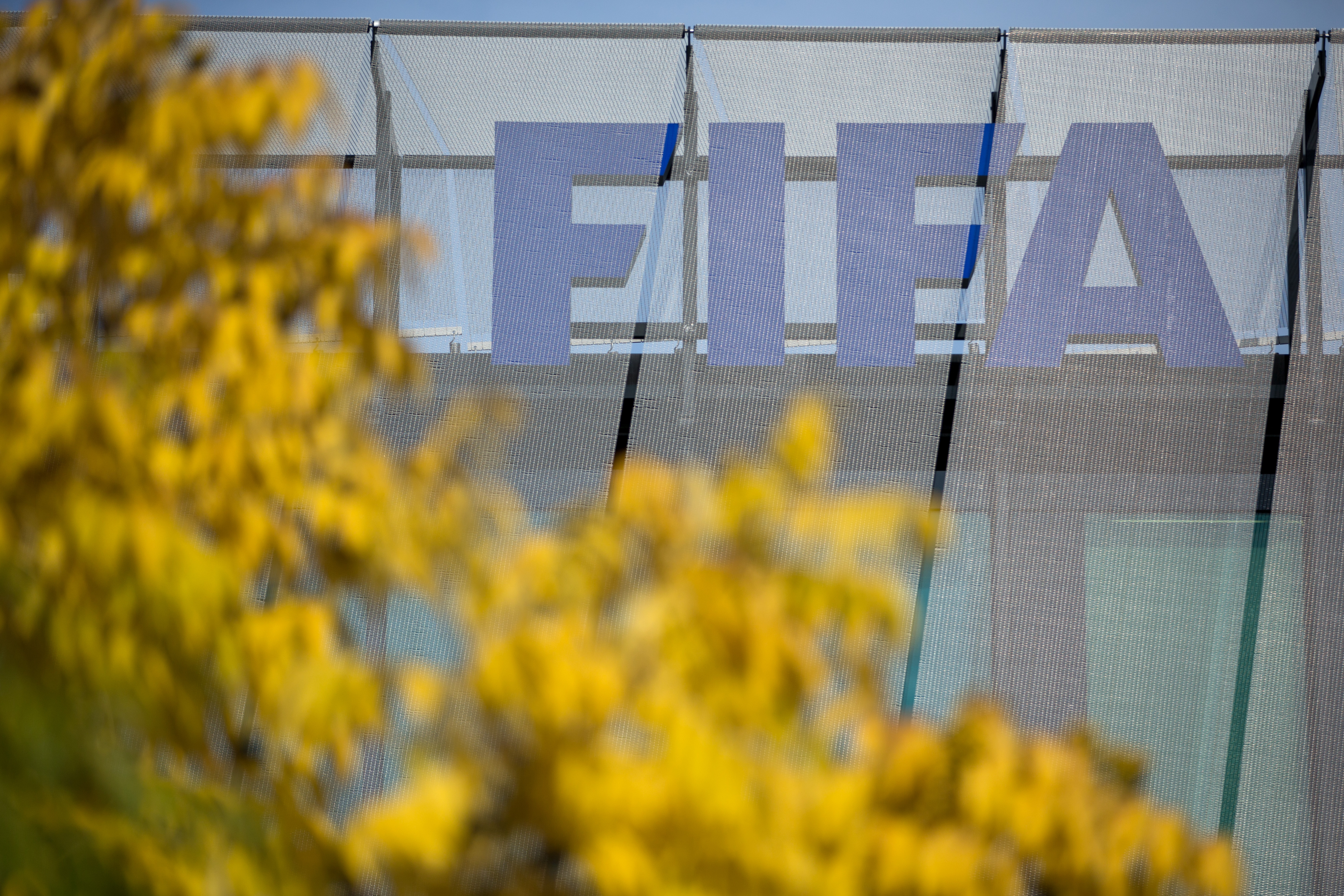 ZURICH, SWITZERLAND - SEPTEMBER 25: A FIFA logo sits on the rooftop at the FIFA headquarters on September 25, 2015 in Zurich, Switzerland. (Photo by Philipp Schmidli/Getty Images)